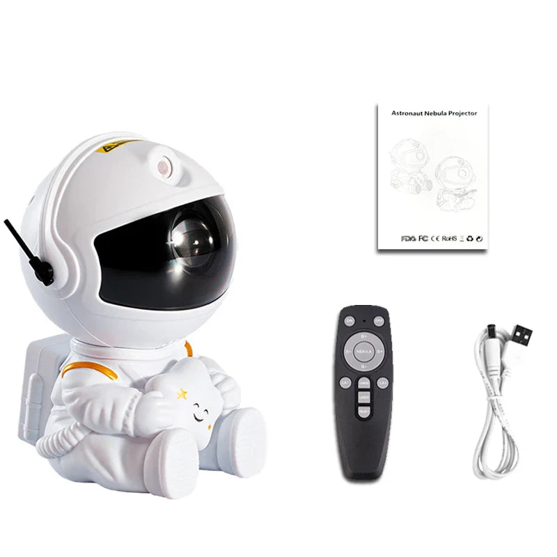Astronaut-shaped projector with remote control and cable on a white background