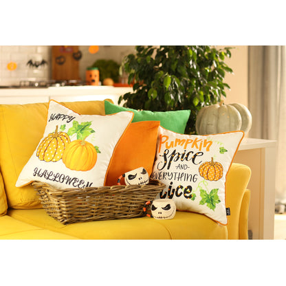 Decorative pillows with Halloween-themed designs on a yellow couch.