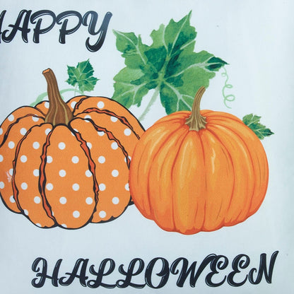 Happy Halloween text with polka dot pumpkins on a light blue background