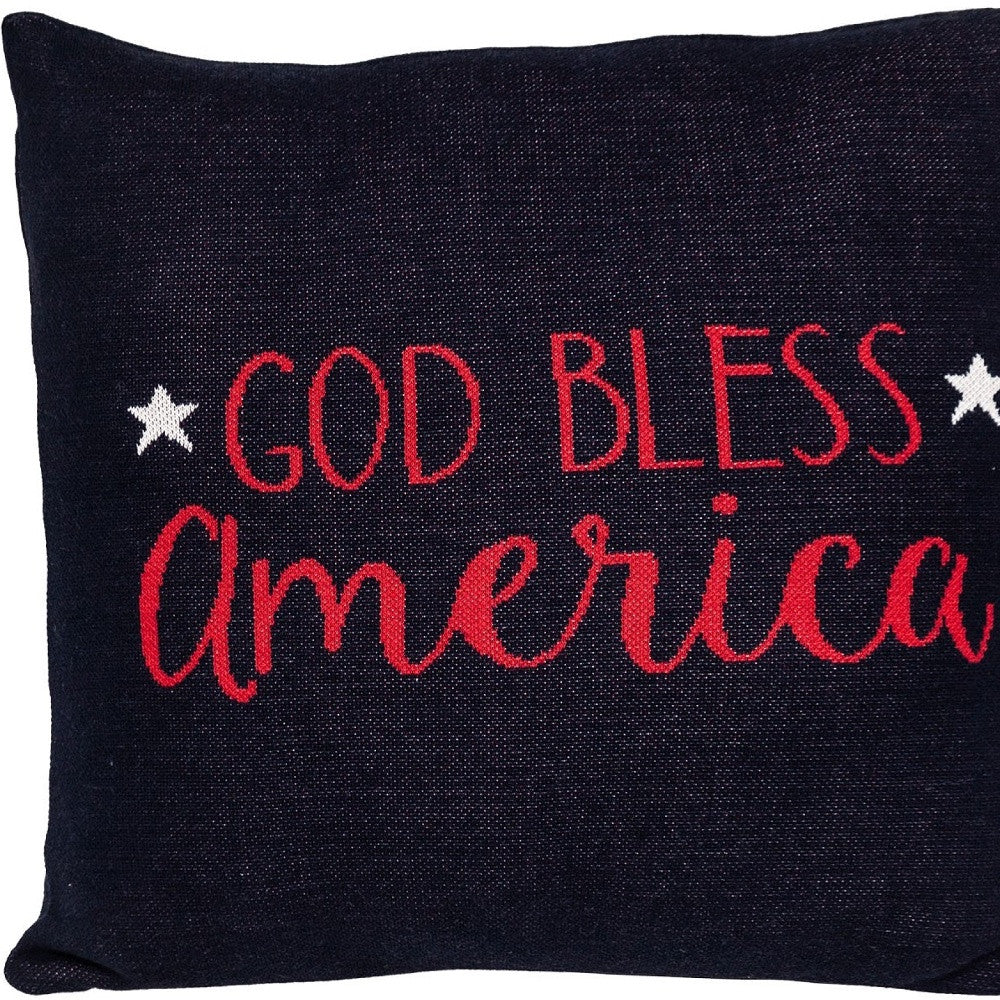 Black pillow with red 'God Bless America' text and stars on a black background