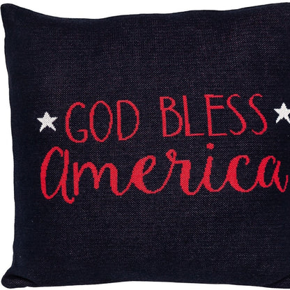 Black pillow with red 'God Bless America' text and stars on a black background