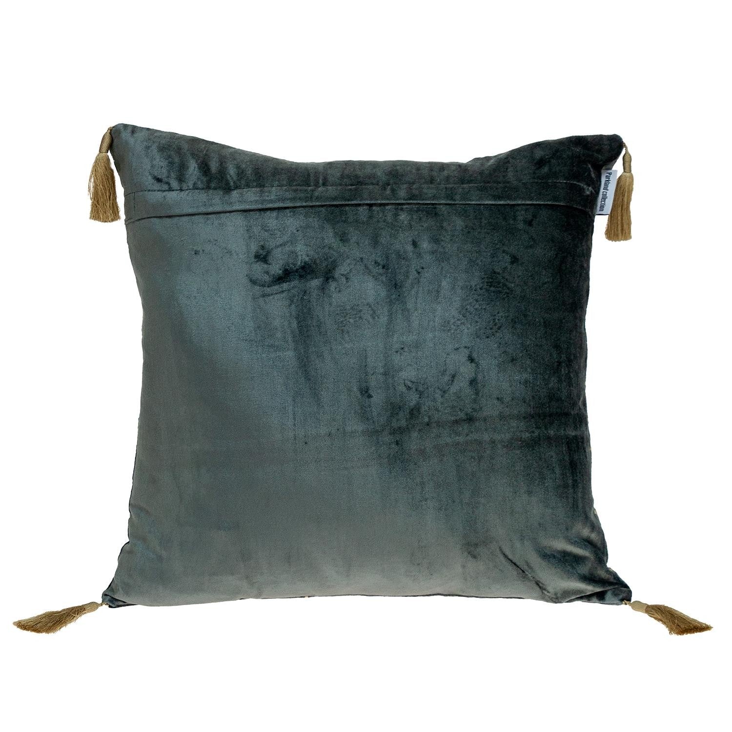 Gray pillow with tassels on a white background