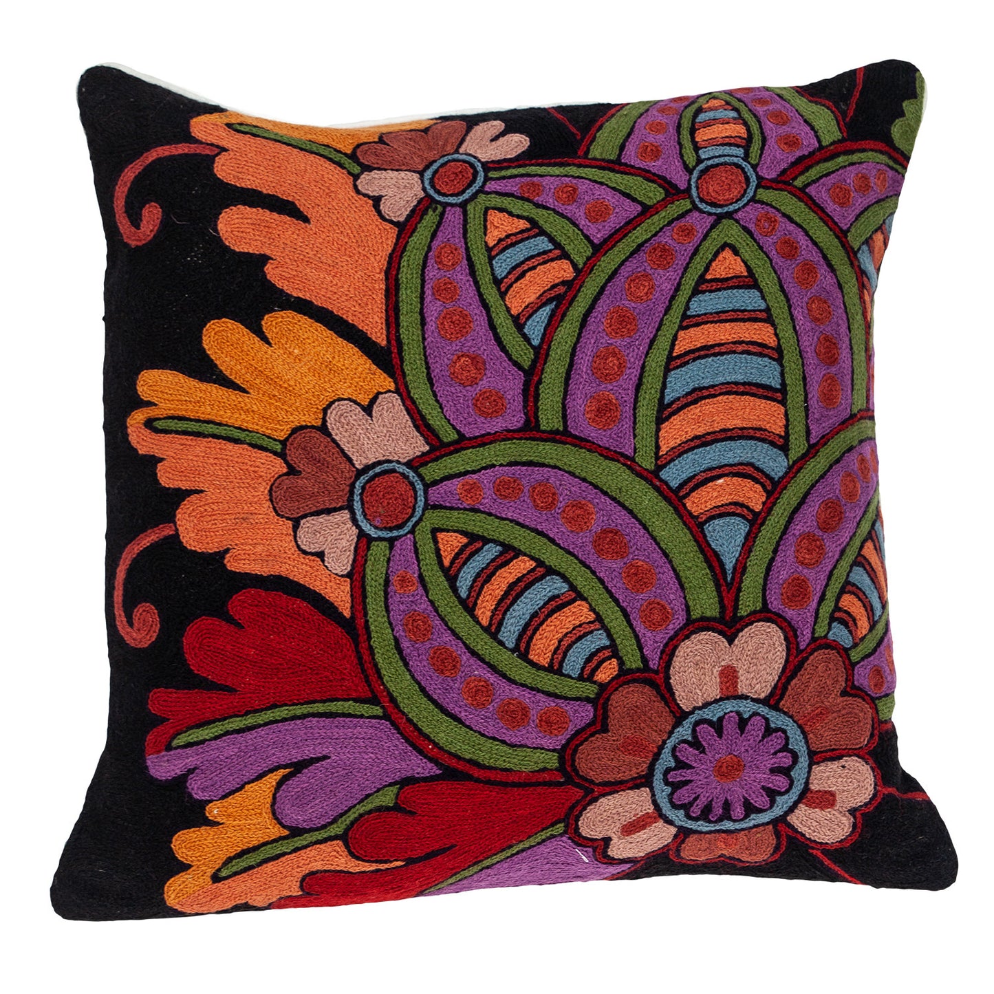 Colorful embroidered pillow with intricate patterns on a black background