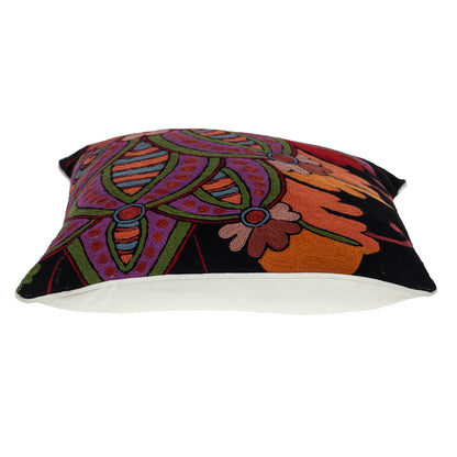 Decorative pillow with a colorful abstract pattern on a white background