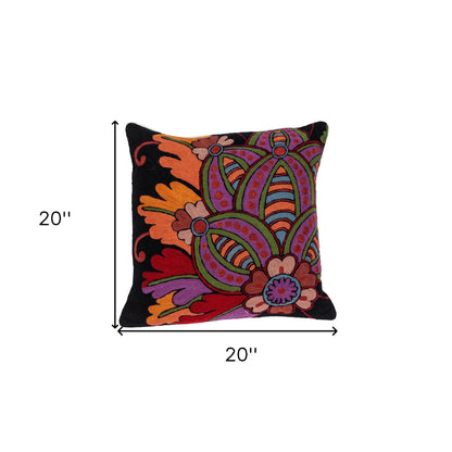 Decorative pillow with colorful patterns and measurements on a white background