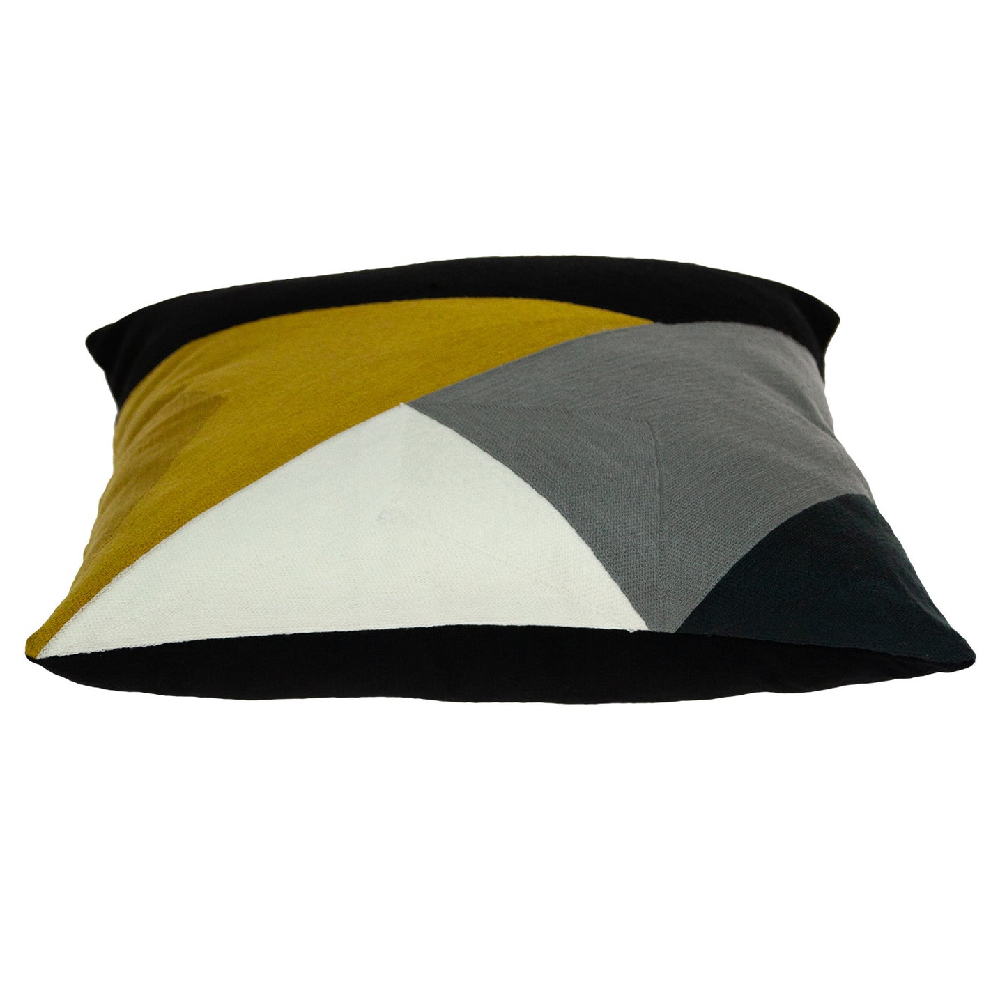 Color-blocked pillow with geometric design on a white background