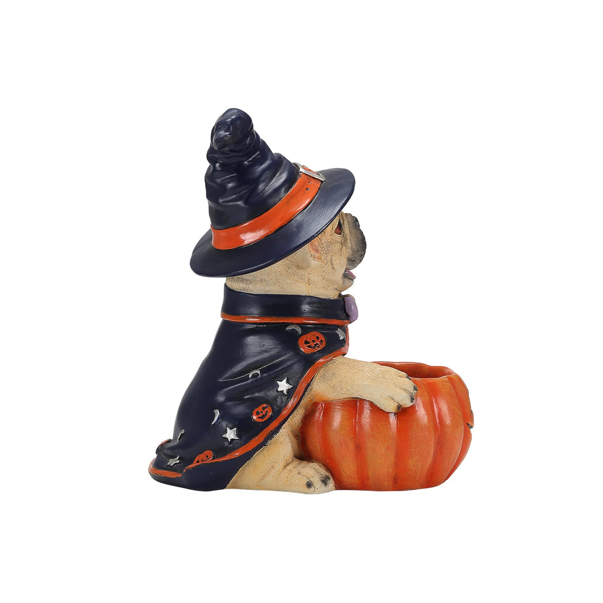 A decorative figurine of a French bulldog dressed as a witch, wearing a black hat with an orange band and a black cape with orange trim and white star/pumpkin details, sitting beside an orange pumpkin on a plain white background.