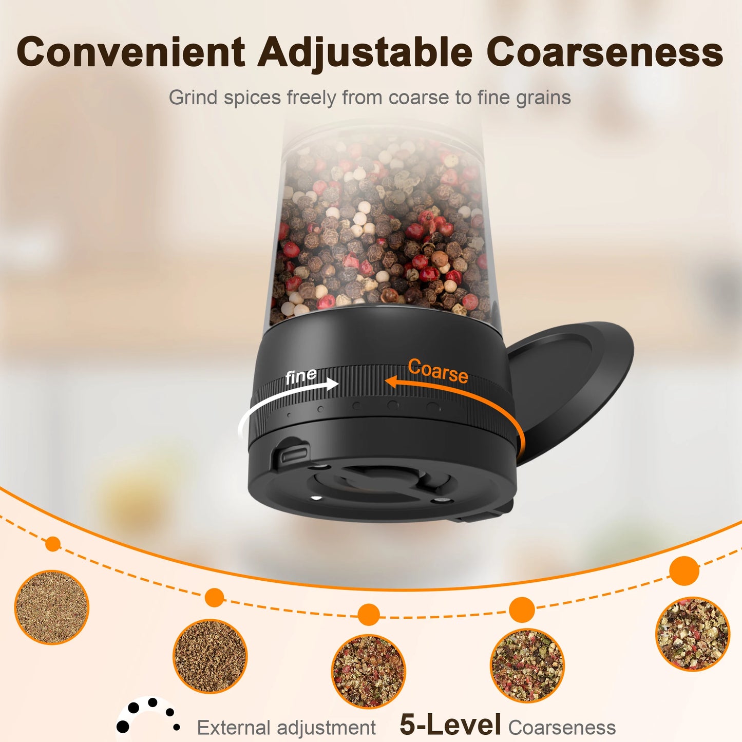 Black spice grinder with adjustable coarseness mechanism, filled with spices on a blurred background.