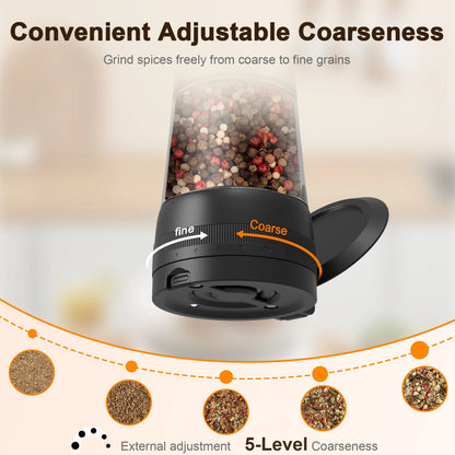 Black spice grinder with adjustable coarseness mechanism, filled with spices on a blurred background.