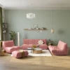 Modern living room with pink sofa, white walls, and decorative items. Red Living Room Sofa Set – 1/2/3 Seater + Ottoman Sectional Couch. 076823-f9.myshopify.com