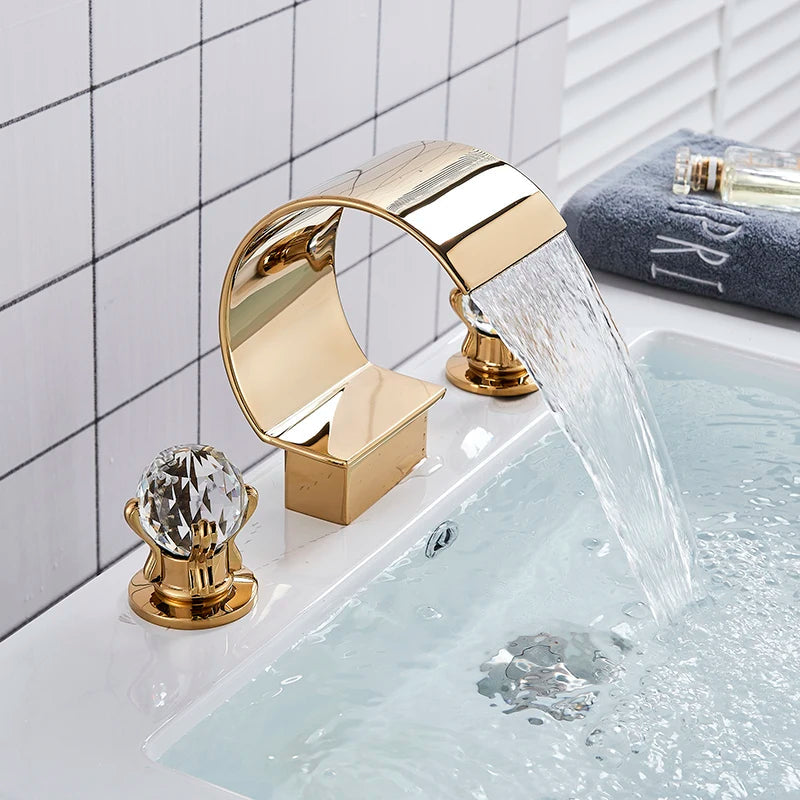 Luxurious Gold Bathroom Basin Faucet Brass  Gold Bathroom Basin Faucet Brass Deck Mounted Double handle Cold and Hot Waterfall Basin faucet Home Fusion