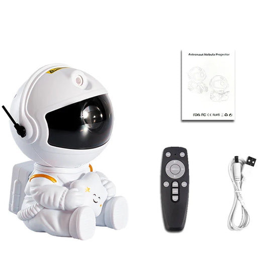 Astronaut-shaped projector with remote control and cable on a white background