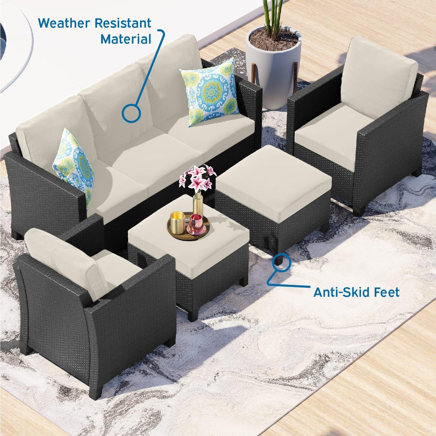 Outdoor patio furniture set with weather-resistant material and anti-skid feet on a rug.