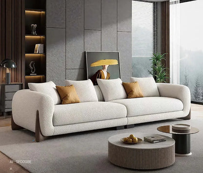 Modern White Upholstered 3-Seater Sofa with Plush Cushions.