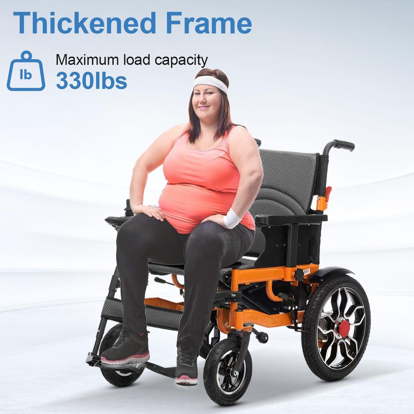 Person using a wheelchair with a thickened frame, maximum load capacity 330lbs, on a white background.